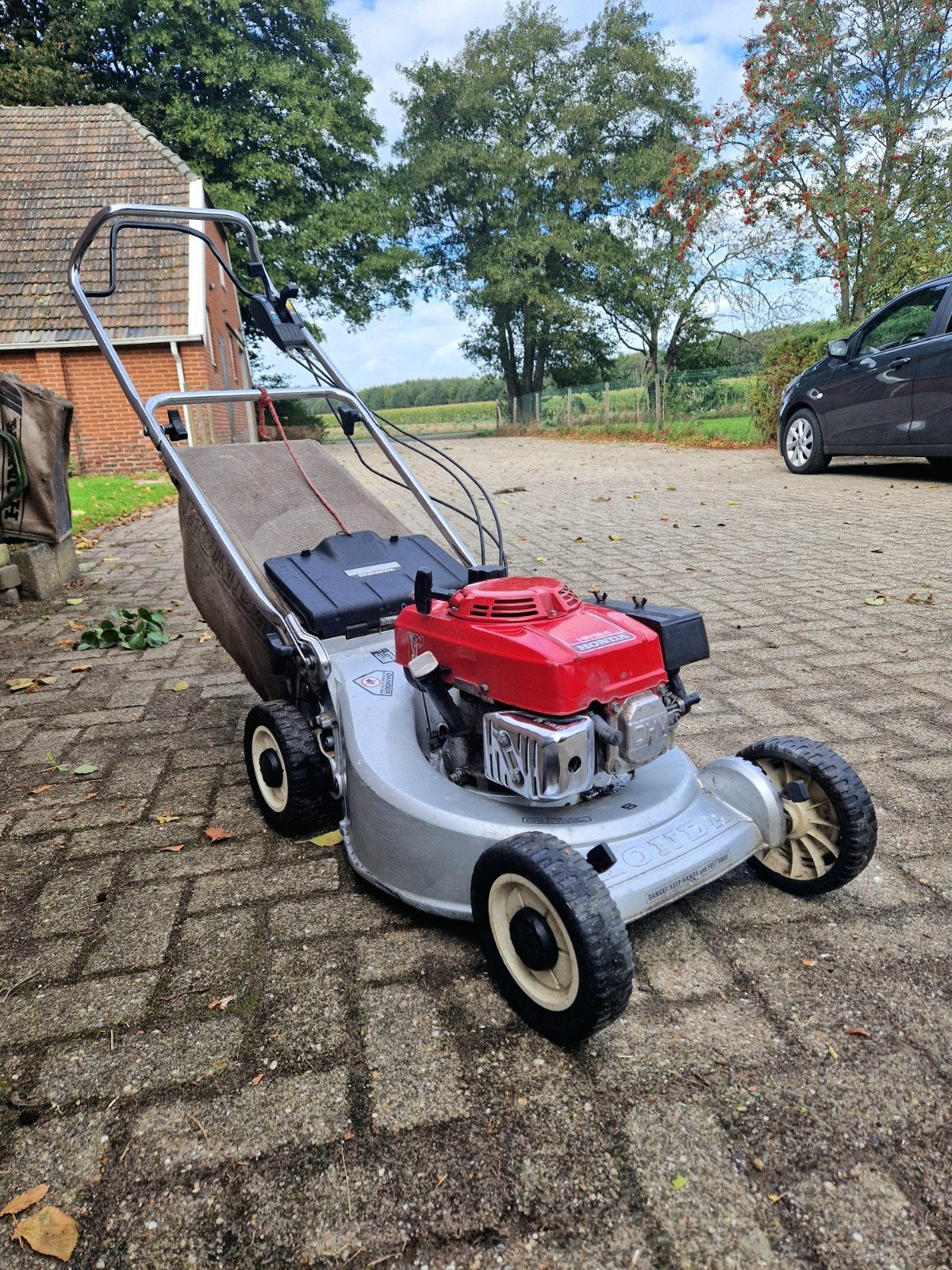 Honda HR194 Benzinemaaier zelfrijdend, Tuin en Terras, Ophalen, Gebruikt, Versnellingen, Benzine-grasmaaier