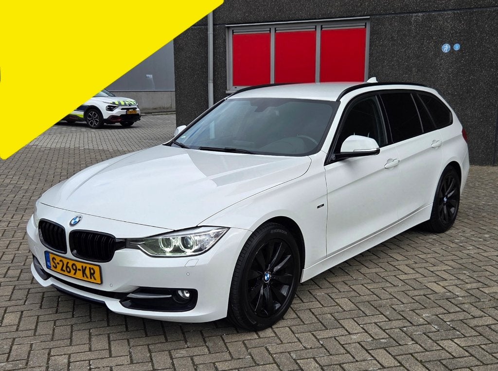 BMW 3-Serie 318I AUTOMAAT Touring M-sport 2013 NAVI / LEER, Automaat, Dealer onderhouden, Zwart, 4 cilinders