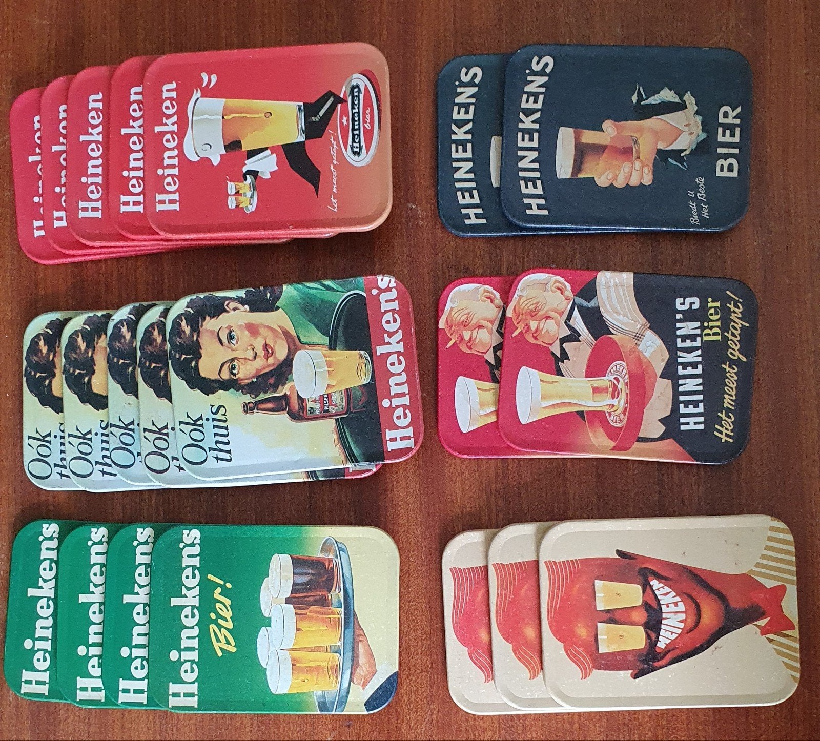 Set van 21 Vintage Heineken Bierviltjes / Onderzetters, Ophalen of Verzenden, Gebruikt, Gebruiksvoorwerp
