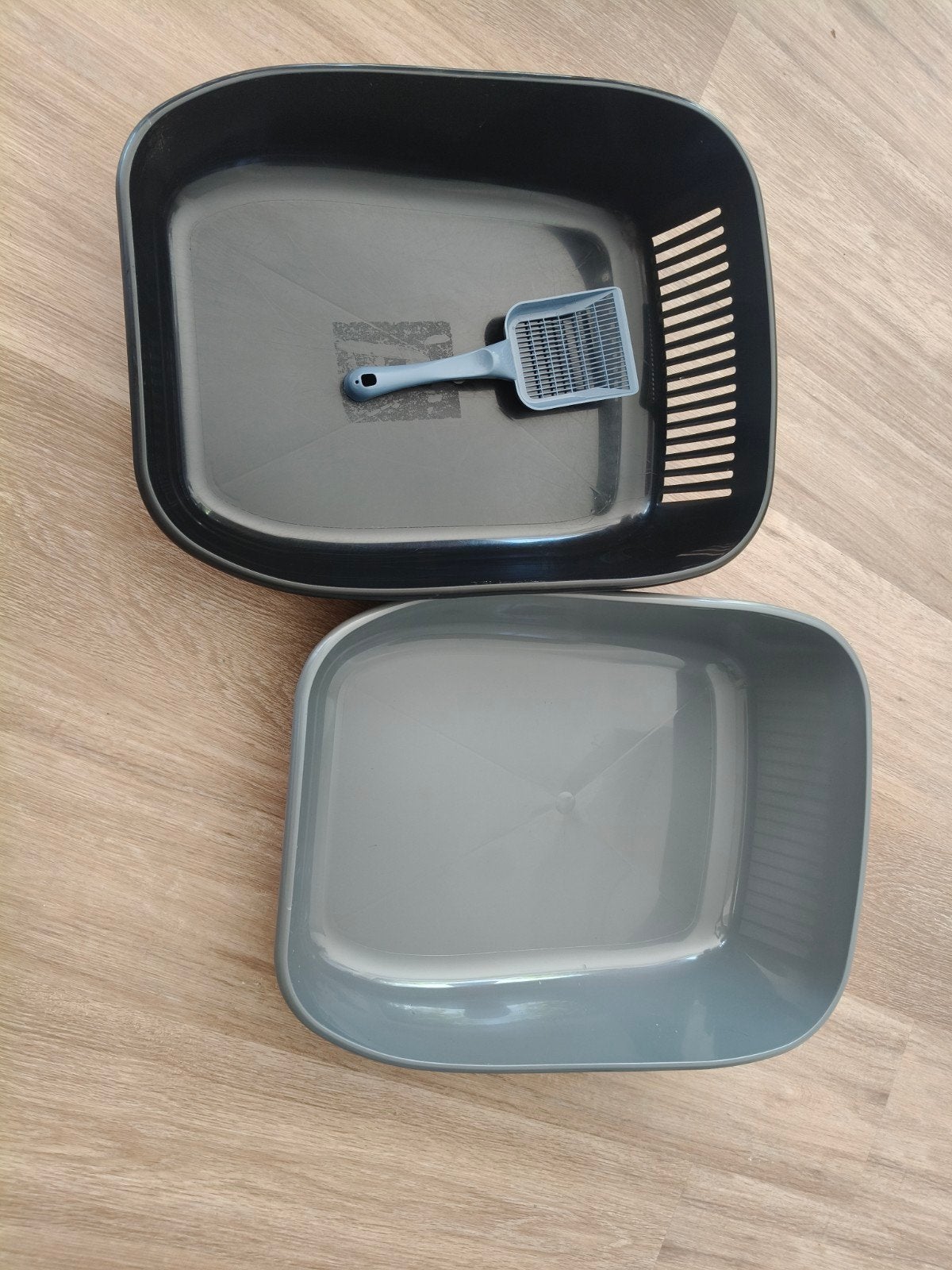 Open kattenbak, Ophalen