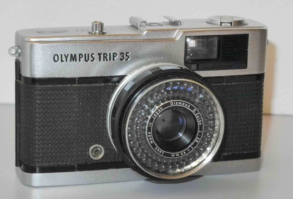 Olympus Trip 35 +flitser, Ophalen of Verzenden, Refurbished, Spiegelreflex, Canon