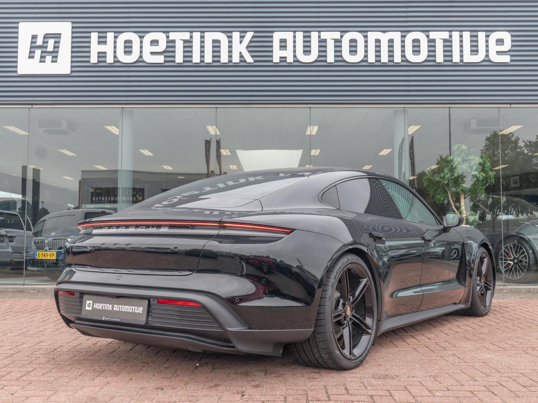 Porsche Taycan Performance 84 kWh | 4-wiel sturing | Hud | B, Auto's, Automaat, Achterwielaandrijving, Gebruikt, Zwart