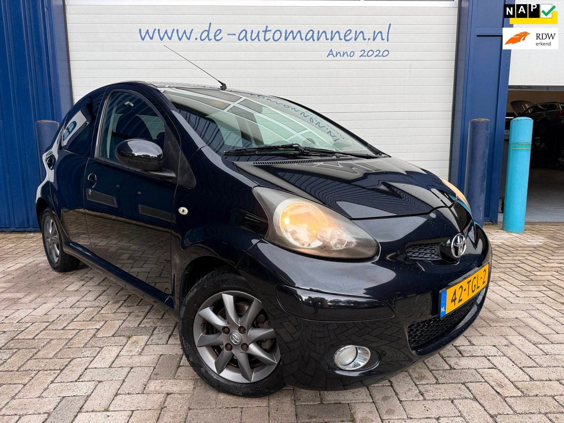 Toyota Aygo 1.0-12V Dynamic Navigator AUTOMAAT 5-drs / AIRCO, Euro 5, Stof, Gebruikt, Zwart