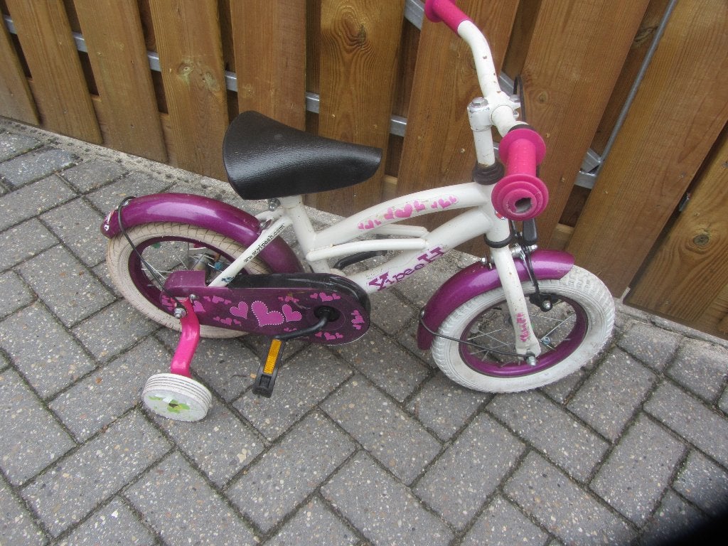 te koop kinderfiets  12 inch., Ophalen, Terugtraprem, Zijwieltjes, Gebruikt