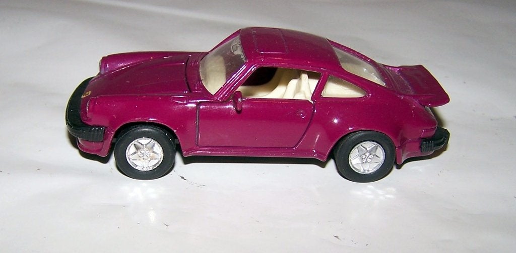 Welly Porsche Carrera model. Izgs., Ophalen of Verzenden, Zo goed als nieuw, Auto, Overige merken