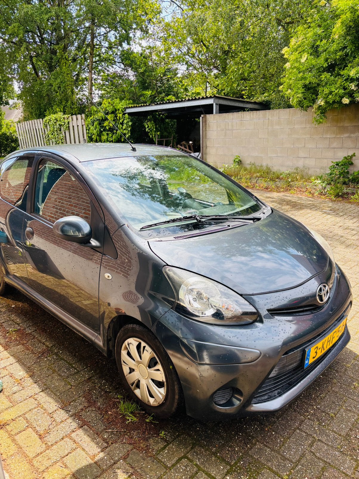 Toyota Aygo 1.0 12V Vvt-i 5DRS 2012 Grijs, Auto's, Voorwielaandrijving, Euro 5, Stof, Zwart