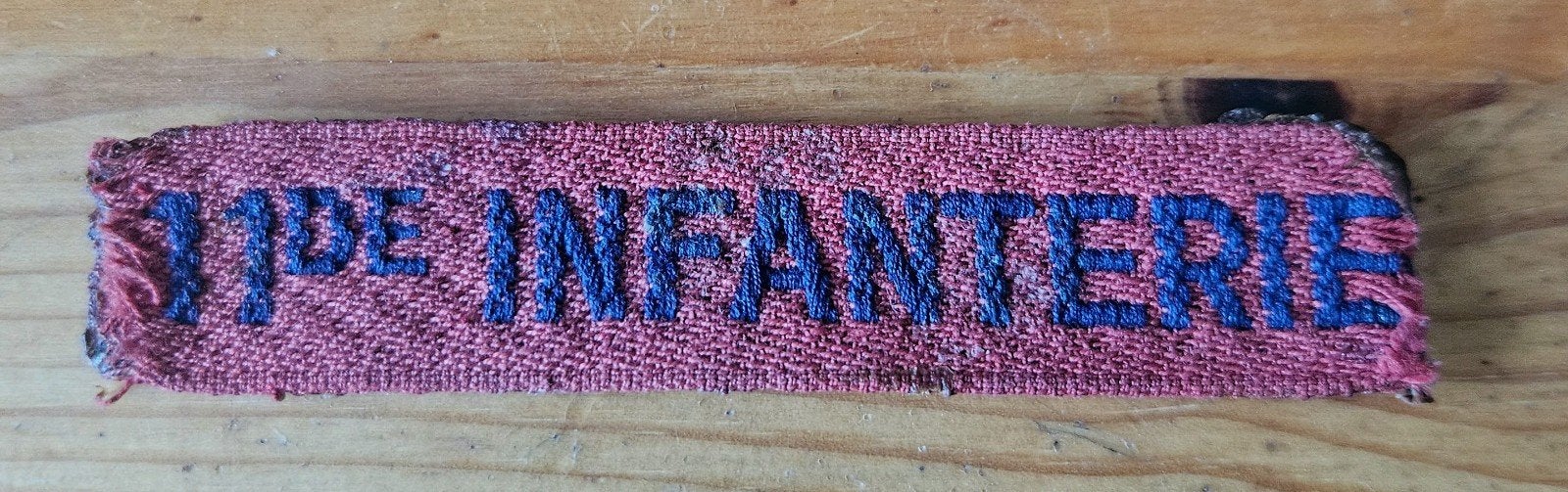 Naamlint 11de Infanterie, Verzamelen, Militaria | Algemeen, Ophalen of Verzenden, Landmacht, Nederland, Embleem of Badge