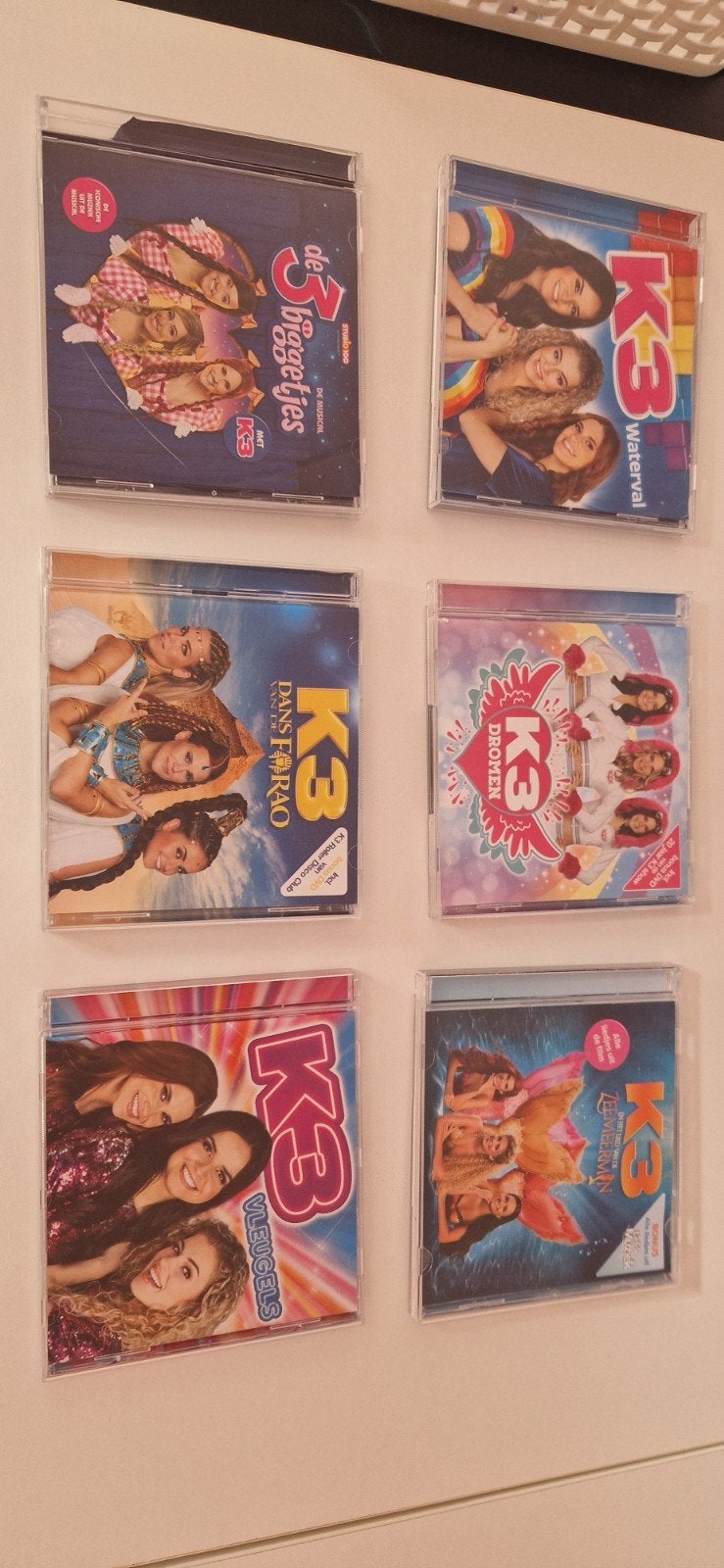 K3 CD's en DVD's - Dromen, Dans van de Farao, Waterfal, etc., Inclusief DVD, Alle leeftijden, Zo goed als nieuw, Familie