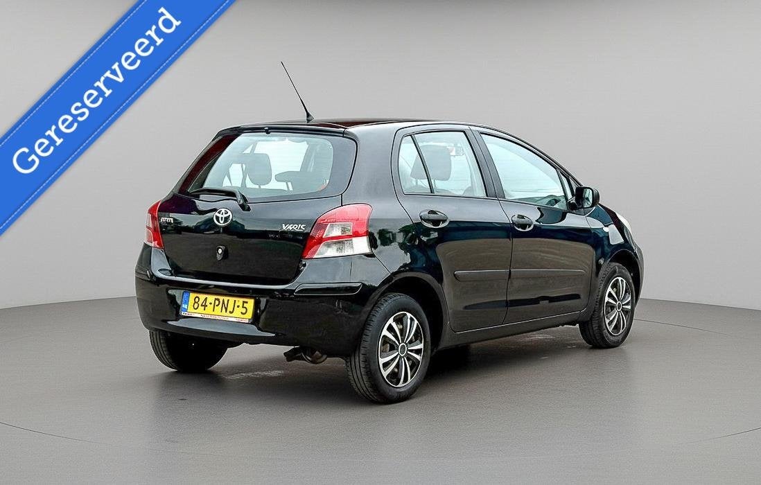 Toyota Yaris 1.0 VVTi Cool, Auto's, Voorwielaandrijving, Euro 5, Zwart, Bedrijf