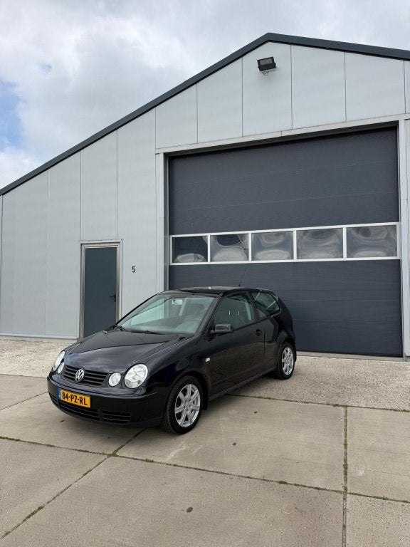 Volkswagen Polo 1.4-16V Athene (bj 2005), Auto's, Voorwielaandrijving, Stof, Zwart, 4 cilinders