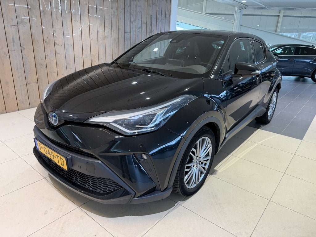 Toyota C-HR 1.8 Hybrid Executive (bj 2022, automaat), Auto's, Euro 6, 4 cilinders, Automatische klimaatregeling, Zwart