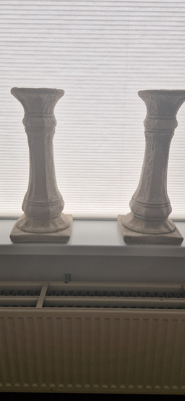 Twee zware stenen pilaren, Ophalen