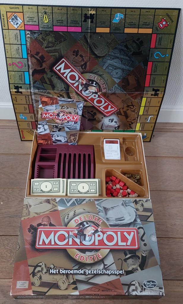 Monopoly Deluxe Editie - Het beroemde gezelschapsspel, Hobby en Vrije tijd, Gezelschapsspellen | Bordspellen, Ophalen of Verzenden