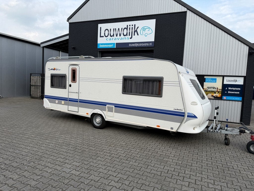 HOBBY Exclusive 560 UFF ’05 (Queensbed, Mover), Vast bed, Rondzit, Hobby, 7 tot 8 meter