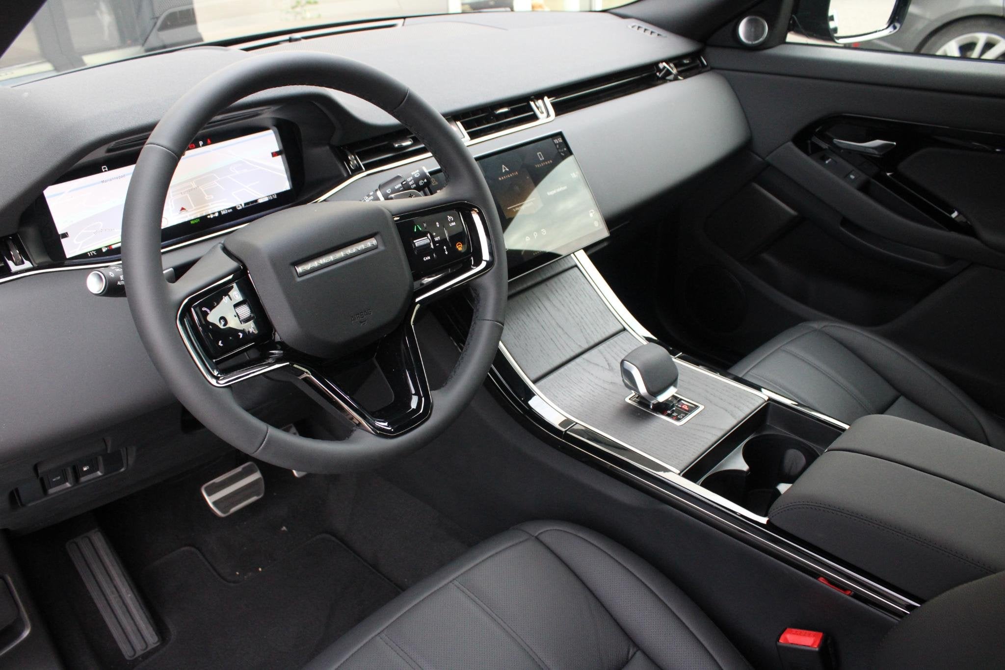 Land Rover Range Rover Evoque P270e AWD Graphite | Pano | Me, Auto's, Land Rover, Automaat, Euro 6, Met garantie (alle), 15 kWh