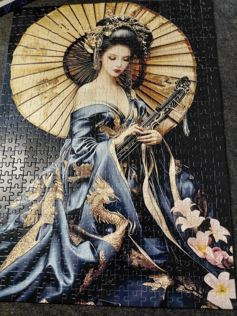 Puzzel 500 stuks japanse vrouw met parasol, Ophalen of Verzenden, 500 t/m 1500 stukjes, Zo goed als nieuw, Legpuzzel