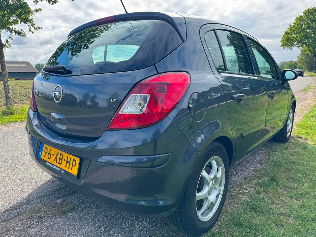 Opel Corsa 1.2-16V Business met airco, Stof, Gebruikt, 4 cilinders, 1229 cc