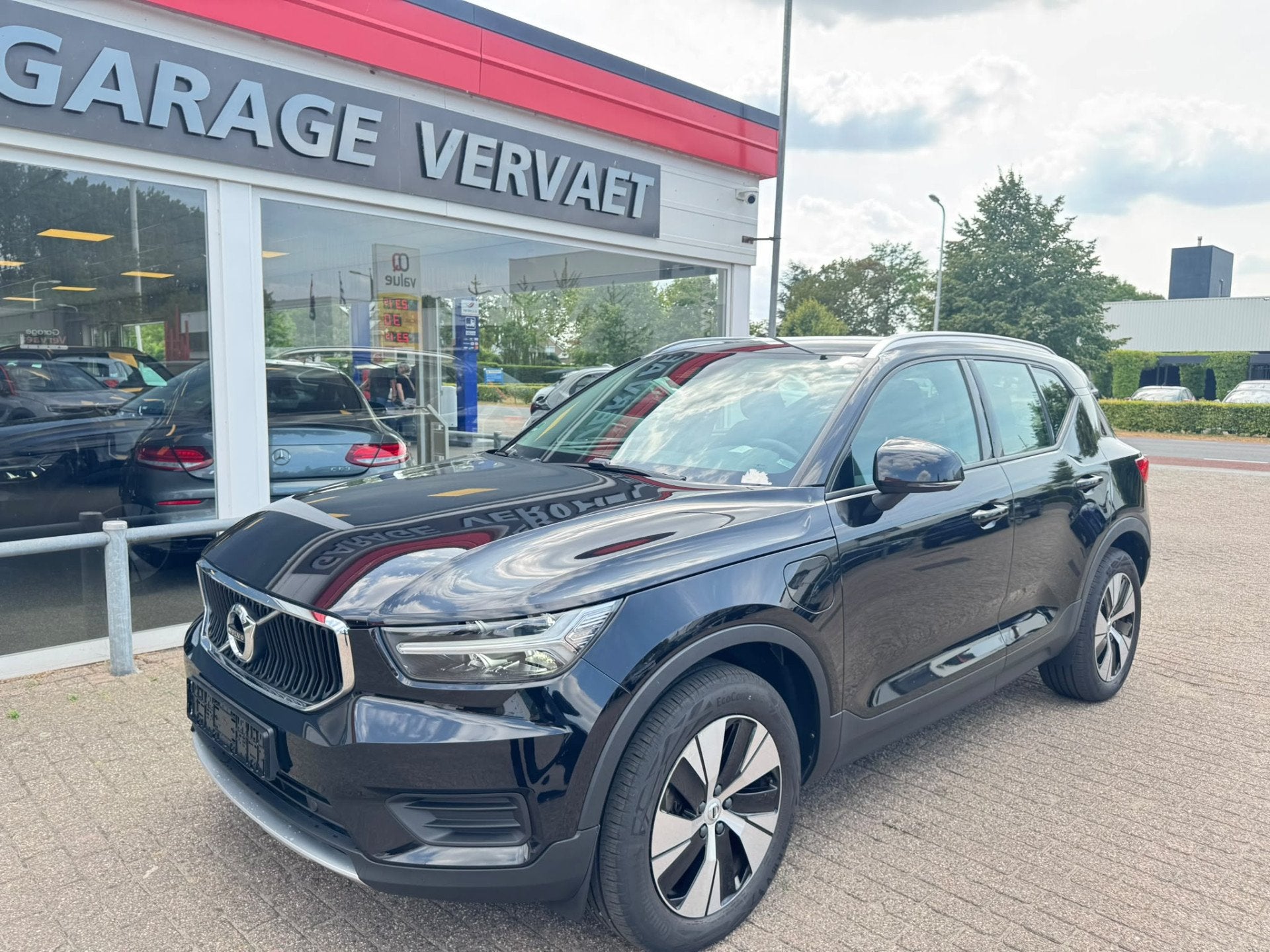 Volvo XC40 1.5 T5 Twin Engine Momentum Pro (bj 2020), Auto's, Automatische klimaatregeling, 1712 kg, Leder en Stof, Zwart