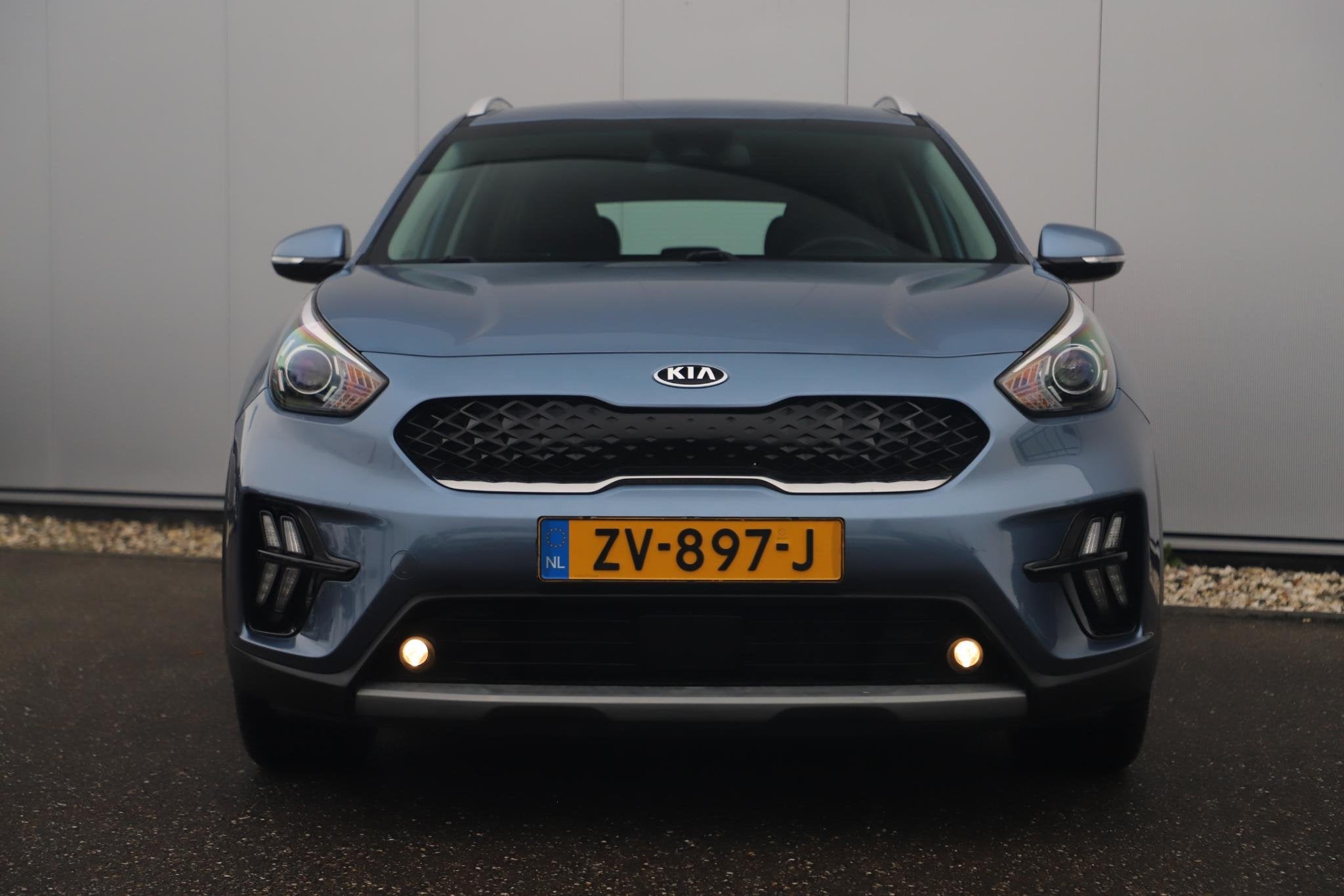 Kia Niro 1.6 GDi Hybrid DynamicLine 140PK Automaat 18 inch H, Auto's, Gebruikt, Euro 6, Blauw, Leder en Stof
