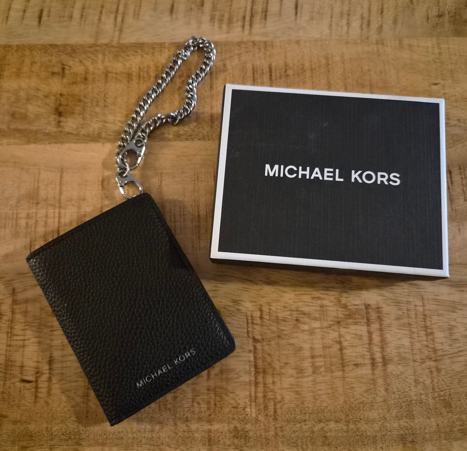 Michael Kors portemonnee, Ophalen