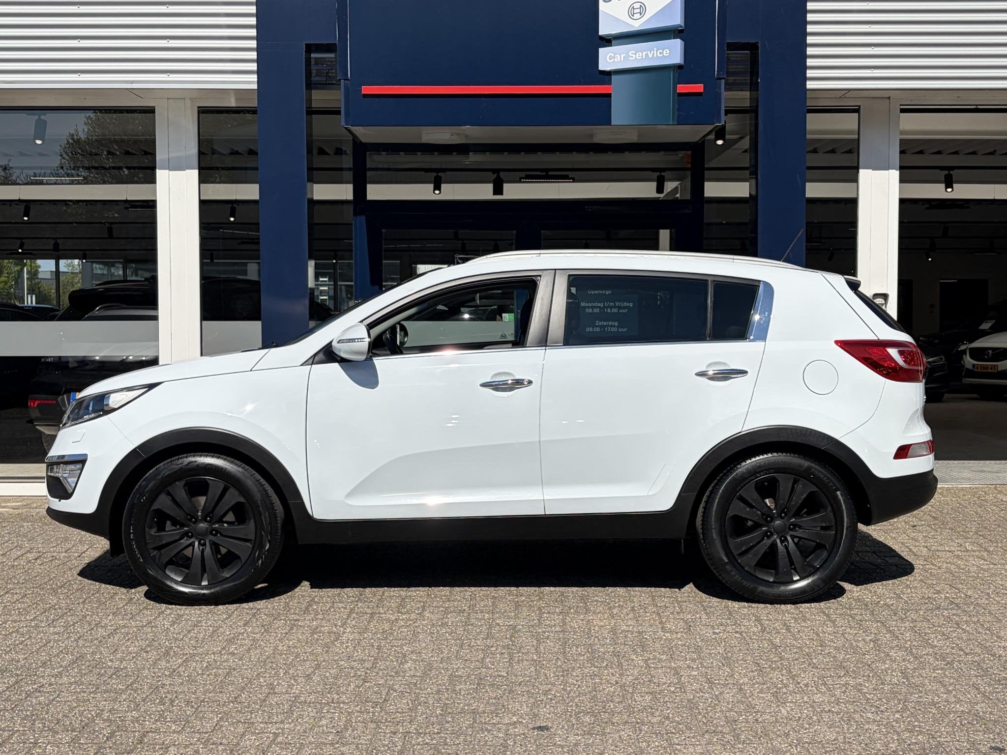Kia Sportage 2.0 X-clusive / Automaat / NL-Auto / Vol-Leder, Auto's, Gebruikt, 4 cilinders, 1600 kg, 736 kg