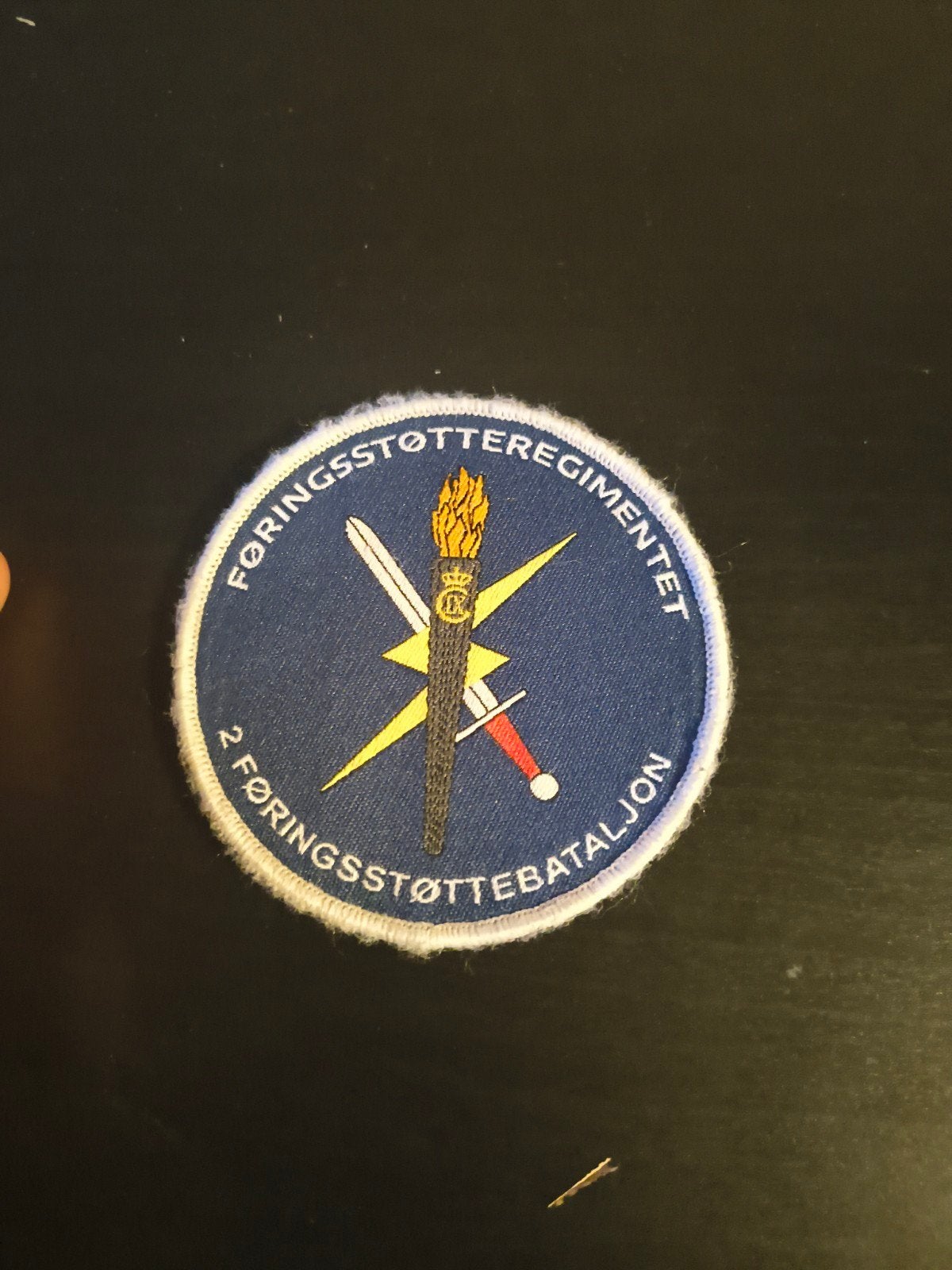 Militair embleem Føringsstøtteregimentet - Noorwegen, Ophalen