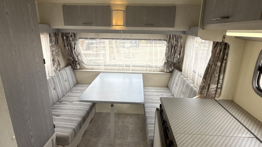 Home-Car Confort 42 bouwjaar 1991 met voortent en luifel, Caravans en Kamperen, Caravans, Bedrijf, 4 tot 5 meter, 500 - 750 kg