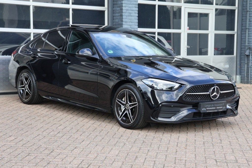 Mercedes-benz C-KLASSE C 300 E  AMG-line panoramadak, Auto's, Met garantie (alle), 167 km/l, Zwart, Sedan