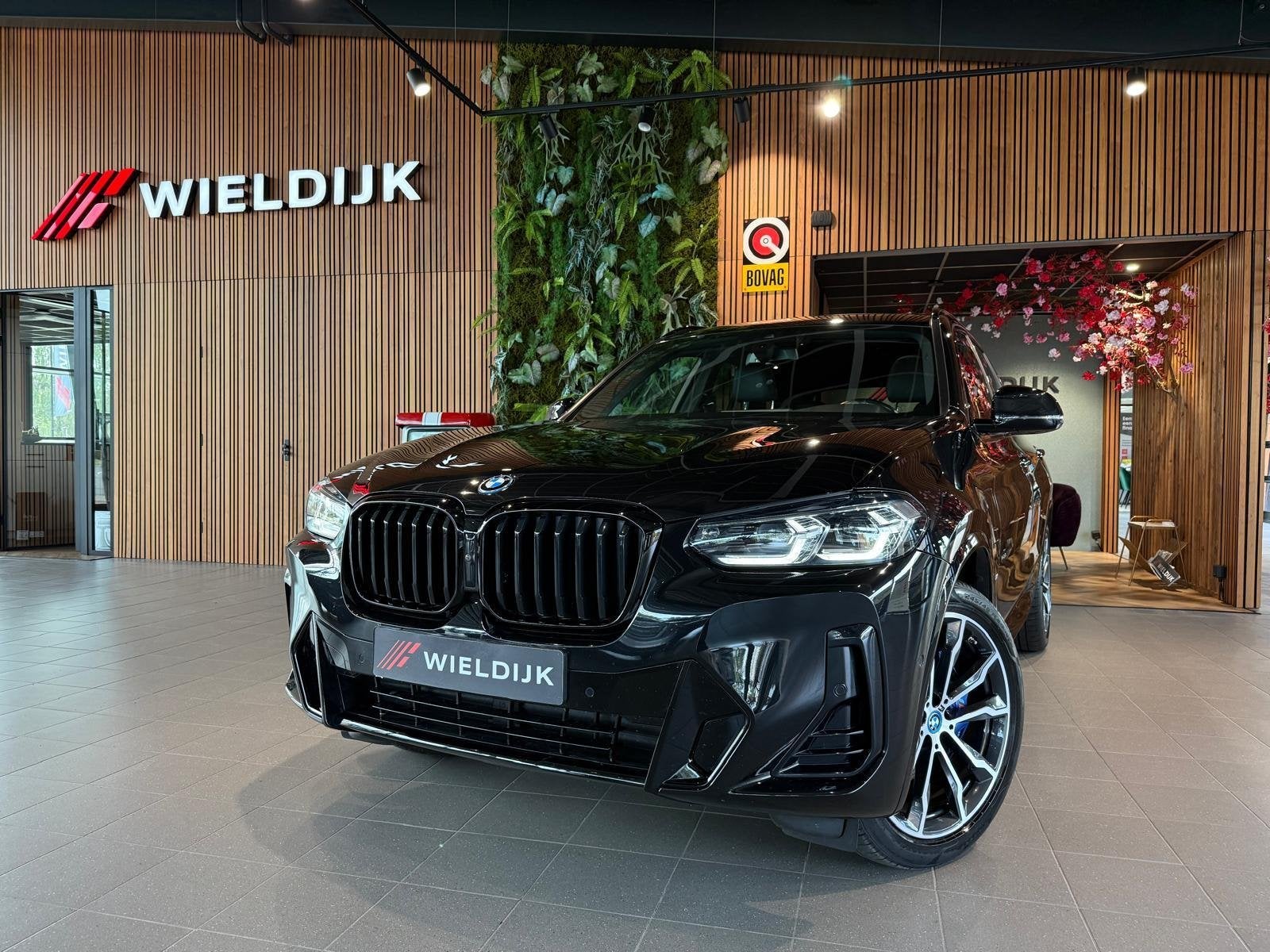 BMW X3 xDrive30e Business Edition Plus pano schuif trekhaak, Auto's, 4 cilinders, 2000 kg, Zwart, Bedrijf
