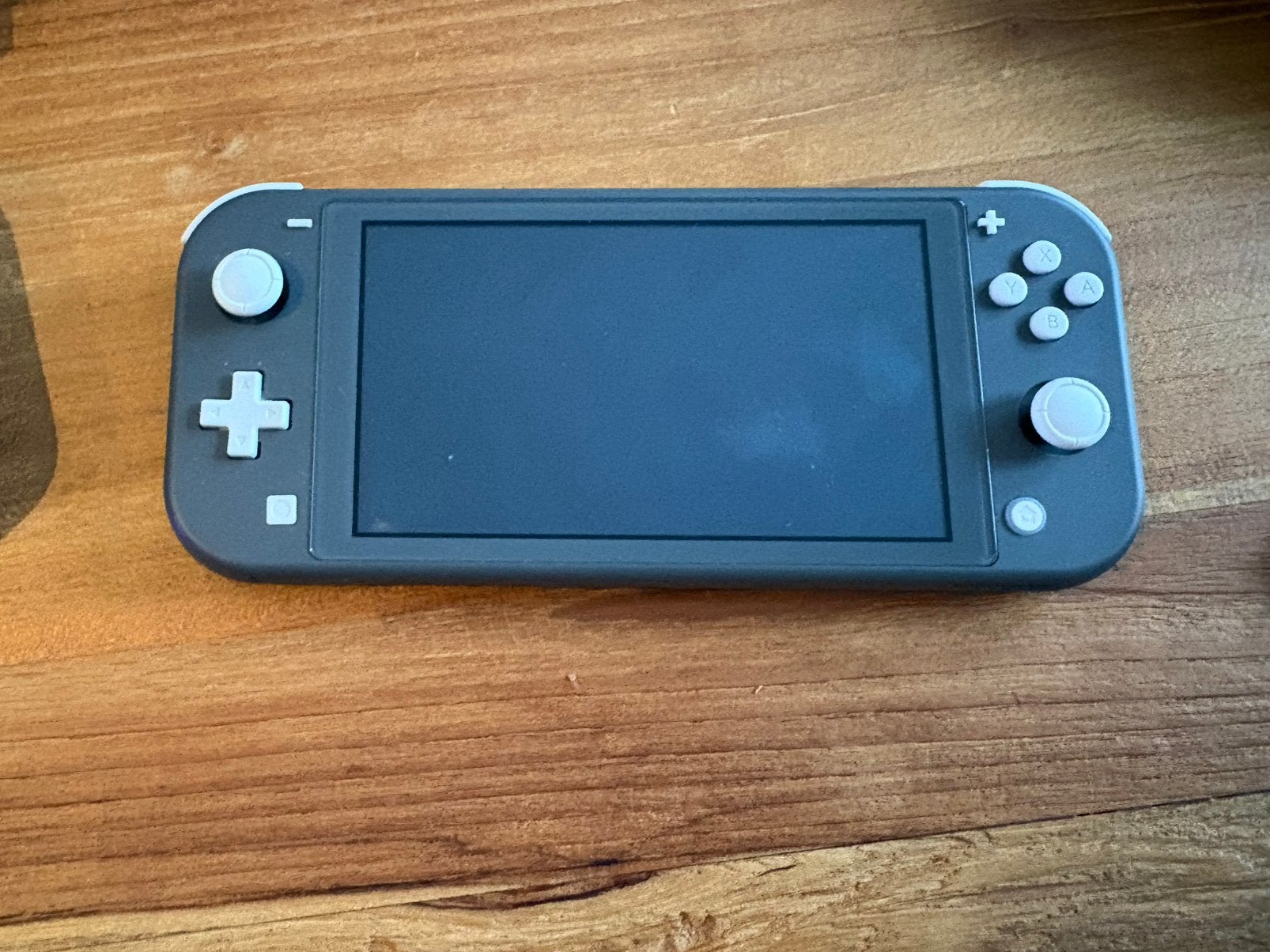 Nintendo switch lite, Spelcomputers en Games, Spelcomputers | Nintendo Switch Lite, Ophalen of Verzenden, Grijs, Zo goed als nieuw