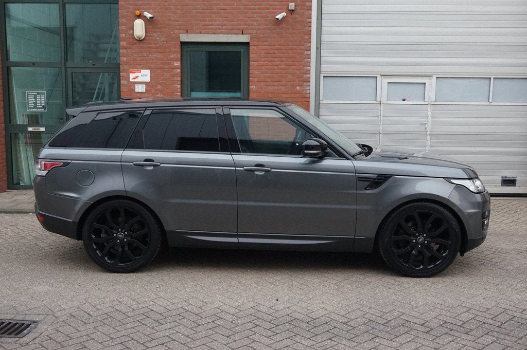 Land Rover Range Rover Sport 3.0 TDV6 HSE Dynamic NL AUTO IN, Auto's, Land Rover, Euro 5, Gebruikt, Zwart, 2993 cc