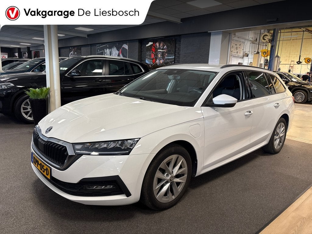 Skoda Octavia Combi 1.4 TSI iV PHEV Business Edition / Navig, Auto's, Skoda, 12 maanden, Stof, Gebruikt, 4 cilinders