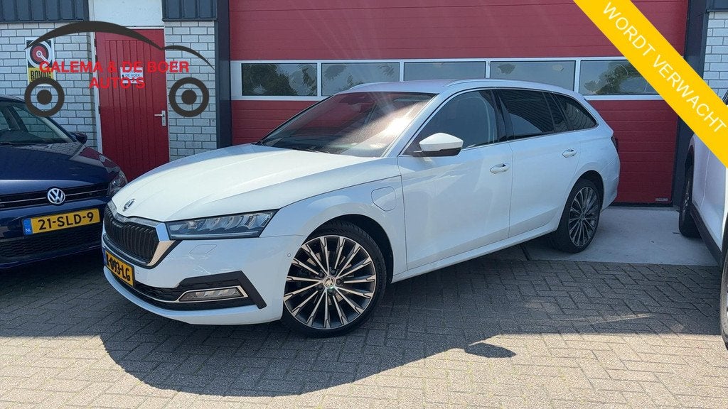 Skoda Octavia Combi 1.4 TSI iV PHEV Business Edition Plus SO, Auto's, Gebruikt, Wit, https://media-marktplaats.export.dv.nl/22559024982/document-1.pdf
