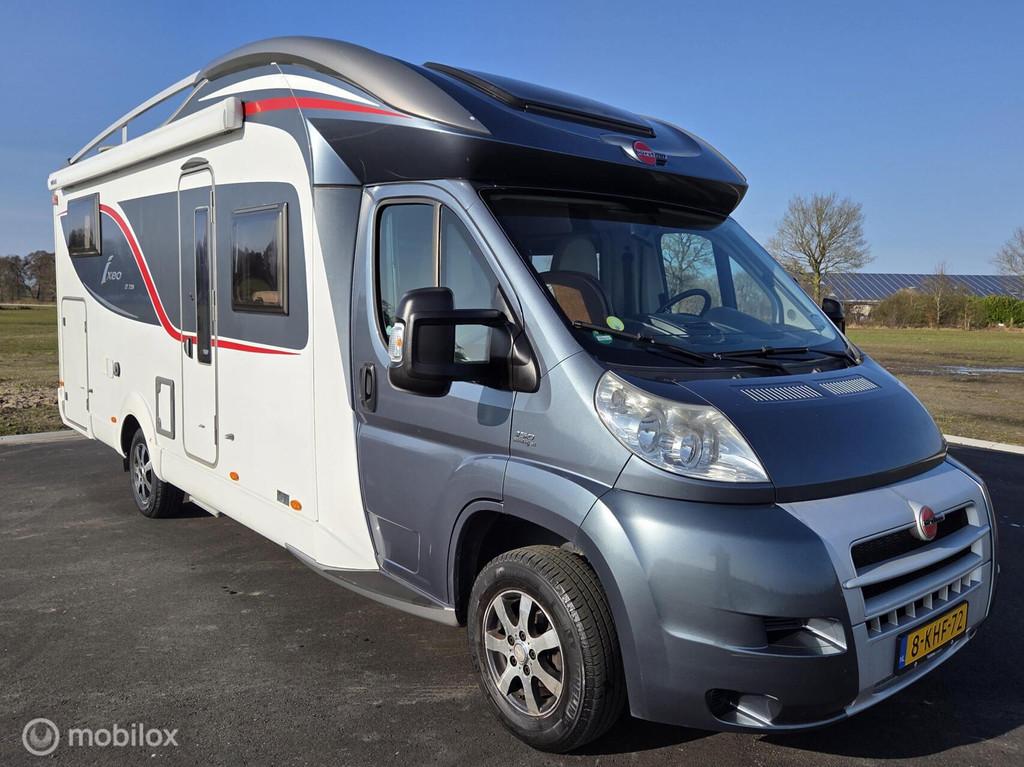Bürstner ixeo IT 726 Enkele bedden, Hefbed ☆Euro 5, Solar, Caravans en Kamperen, Campers, Schotel, Luifel, 7 tot 8 meter, Bedrijf