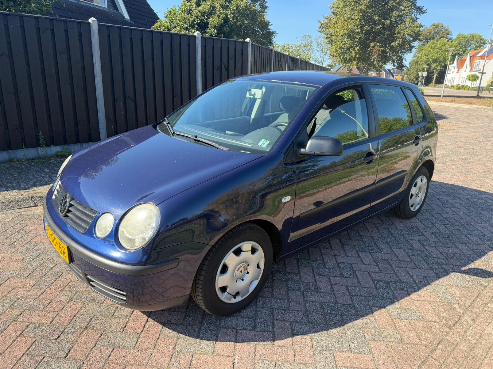 Volkswagen Polo 1.4 Airco Cruise 5drs 2004 Blauw 1e eigenaar, Voorwielaandrijving, 4 cilinders, Verwarmde buitenspiegels, Blauw