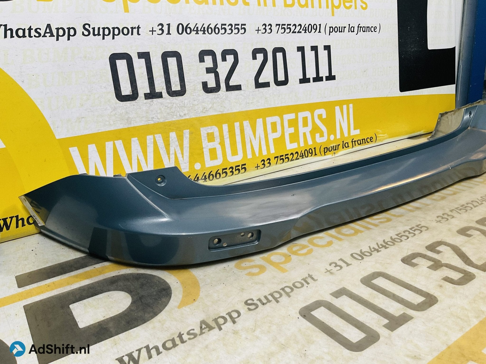 Bumper Ford Transit Courier 2014-2019 ET76-17K823A Achterbum, Bumper