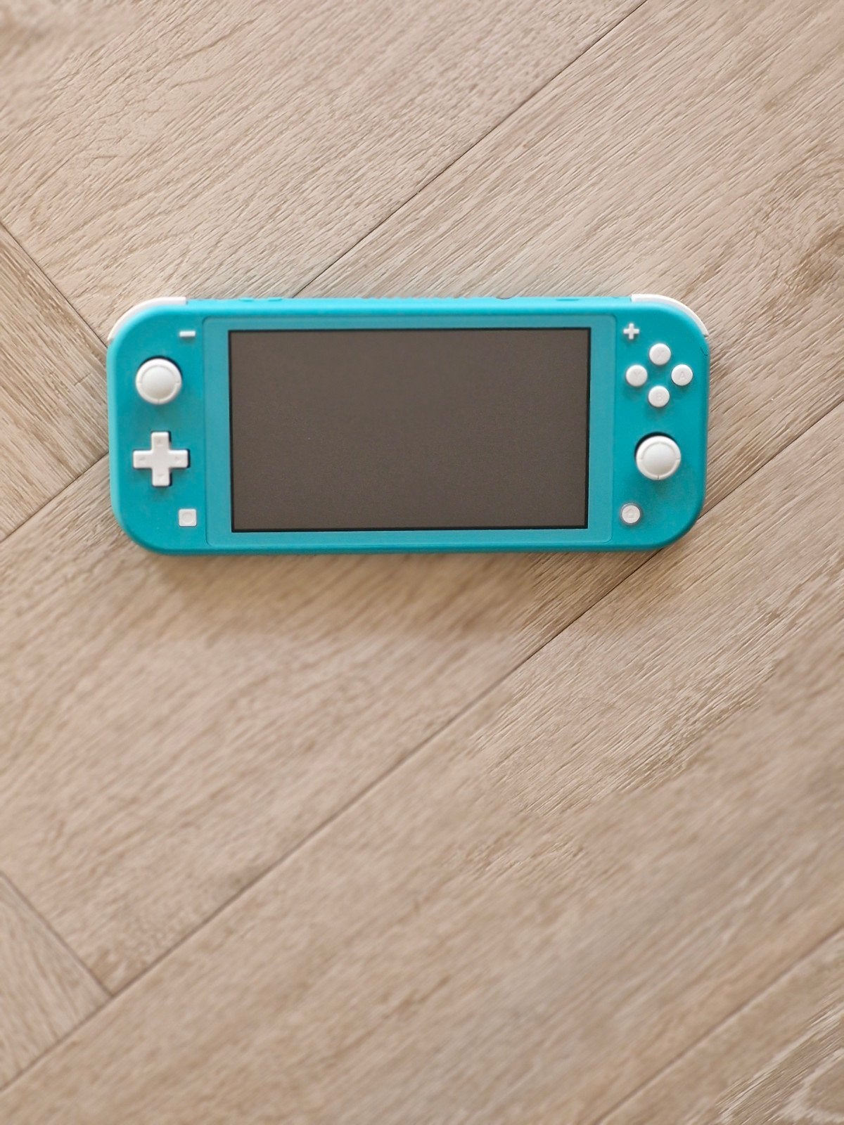 Nintendo Switch Lite Turquoise + Animal Crossing + Minecraft, Ophalen of Verzenden, Turquoise, Zo goed als nieuw, Met beschermhoes of tas