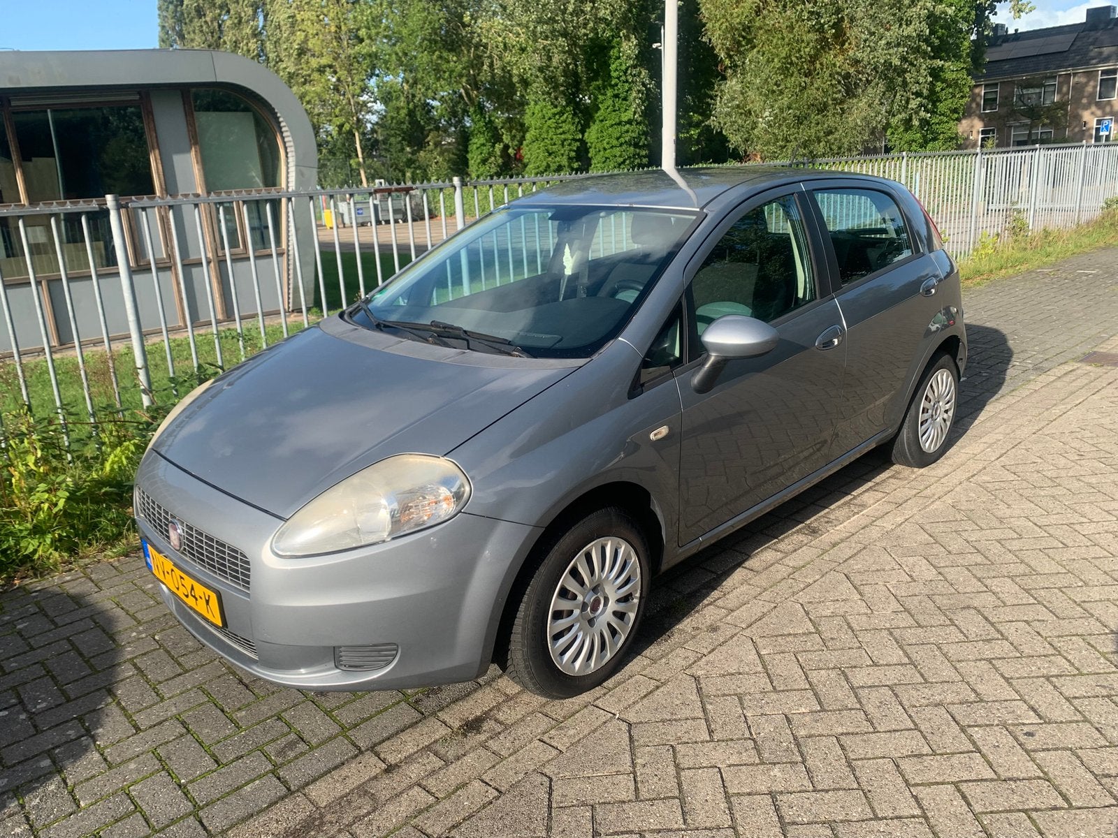Fiat Grande Punto 1.4 Benzine – Veel vernieuwd – 194.271 km, Auto's, Voorwielaandrijving, Stof, Zwart, 4 cilinders