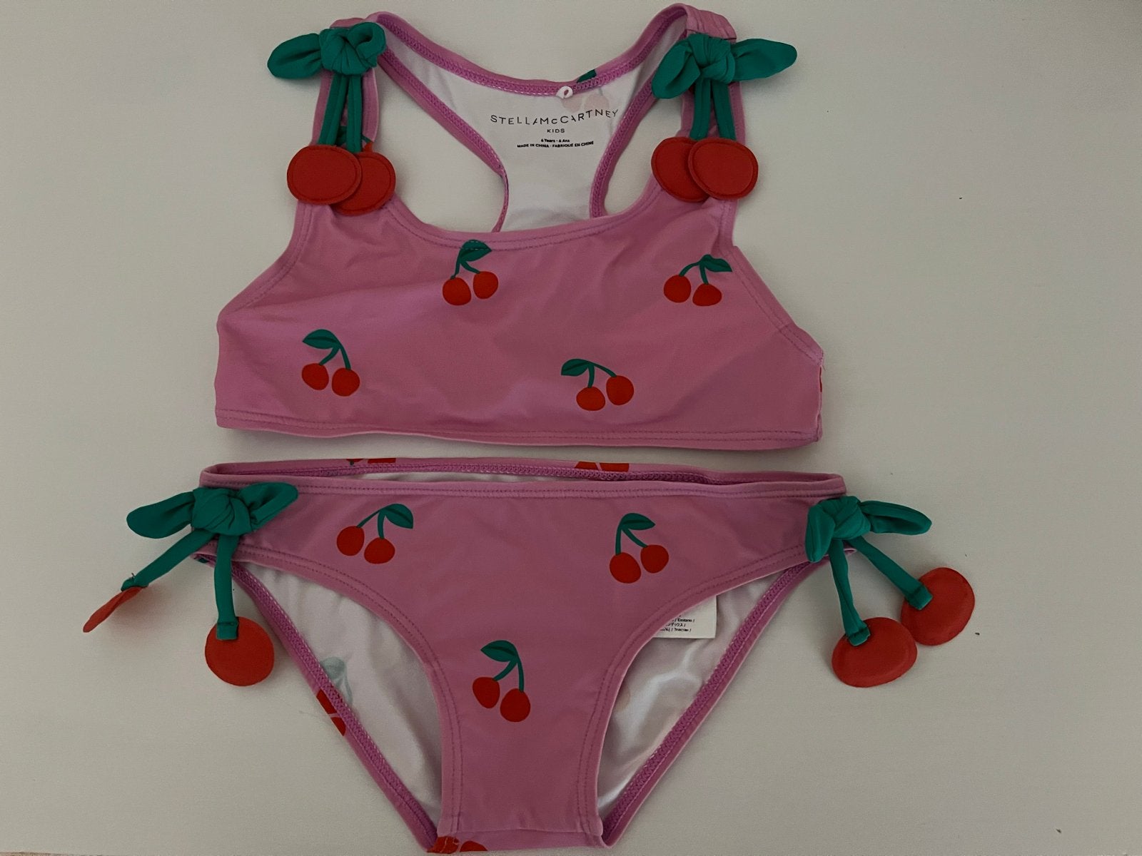 Stella McCartney roze cherry bikini - maat 116 (6 jaar), Meisje, Overige maten, Ophalen of Verzenden, Zo goed als nieuw