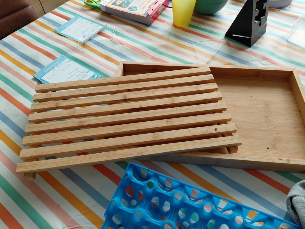 Broodplank die kruimels opvangt niet gratis, Ophalen
