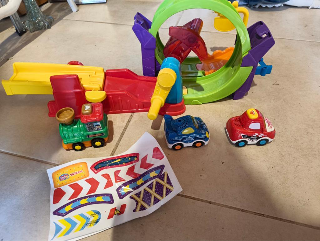 V tech toet toet autobaan met looping, Kinderen en Baby's, Speelgoed | Vtech, Ophalen of Verzenden, Zo goed als nieuw, 2 tot 4 jaar