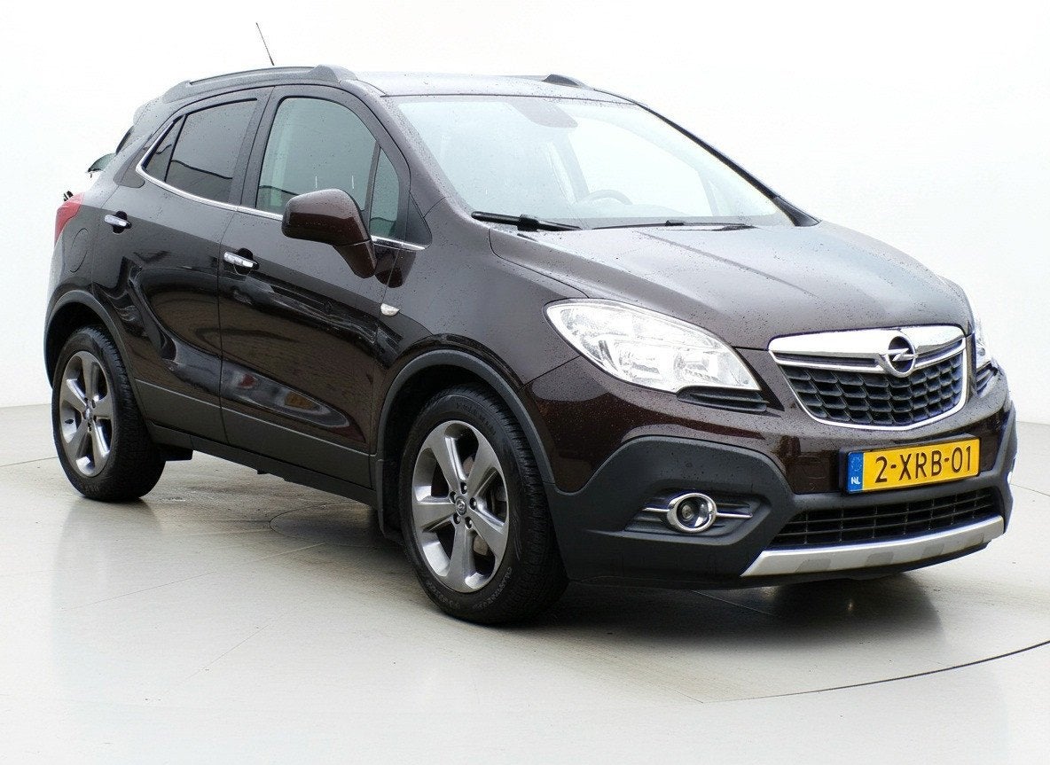 Opel Mokka 1.4 T Cosmo|Cruise|Parkeersensoren|Trekhaak|Airco, Auto's, Voorwielaandrijving, Euro 5, Gebruikt, 4 cilinders