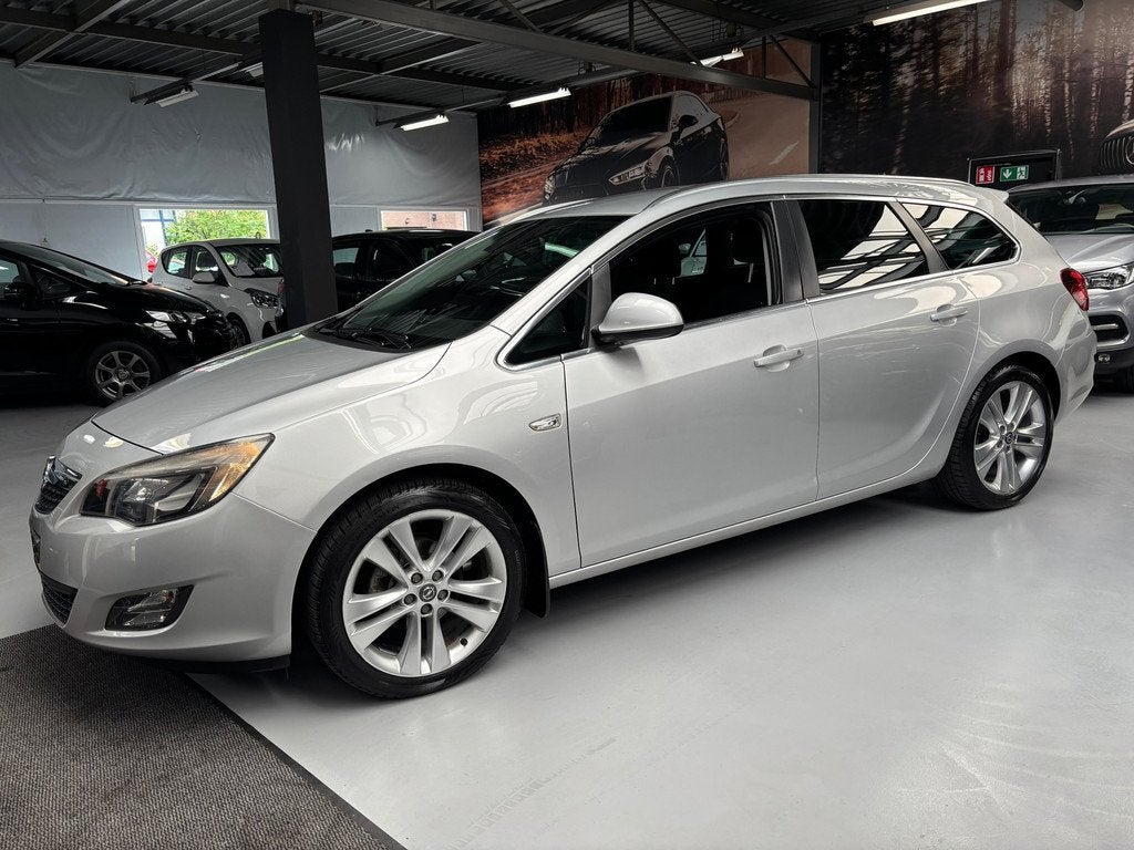 Opel Astra Sports Tourer 1.4 Turbo Sport / Navi / Airco, Auto's, Opel, Voorwielaandrijving, Euro 5, Stof, Gebruikt
