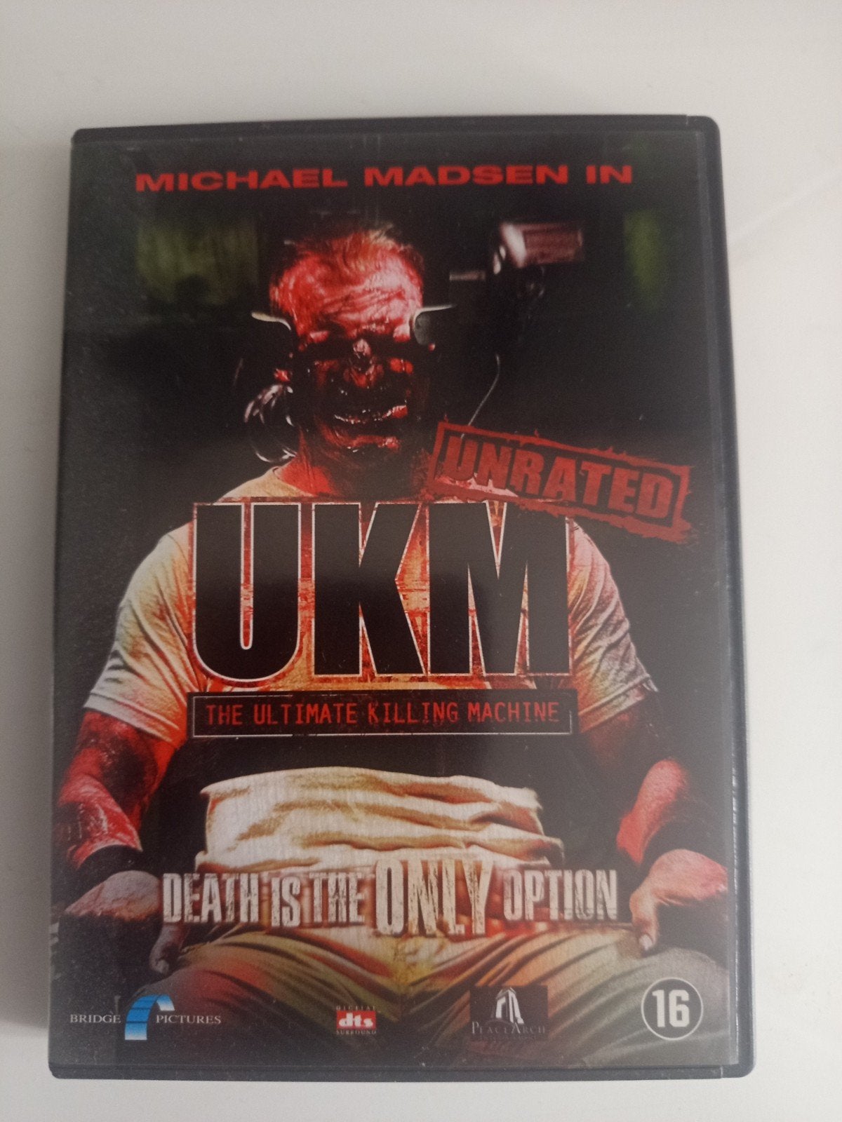 UKM the ultimate killing machine dvd, Cd's en Dvd's, Vanaf 16 jaar, Verzenden, Zo goed als nieuw