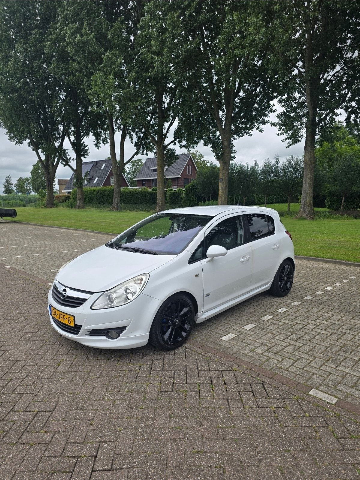 Opel Corsa 1.4 16V 5D 2009 Wit Opc Pakket, Auto's, Opel, Voorwielaandrijving, 1063 kg, 4 cilinders, Handgeschakeld