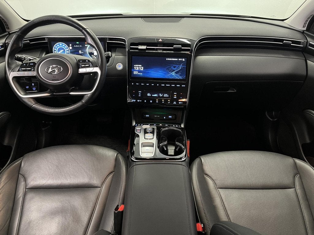 Hyundai Tucson 1.6 T-GDI HEV Premium LEDER | NAVI | LED | 36, Auto's, Hyundai, Gebruikt, Euro 6, Blauw, 1650 kg