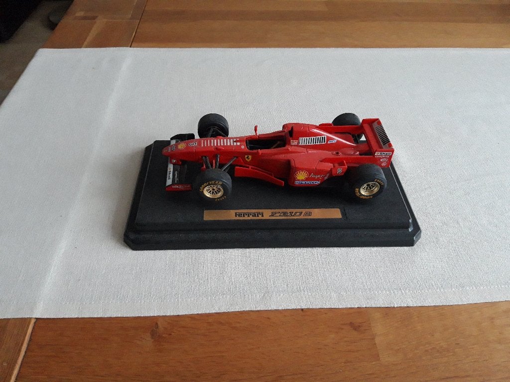 Bburago Formule 1 Ferrari F310 B nr. 5 Michael Schumacher, Ophalen of Verzenden, Gebruikt, Formule 1