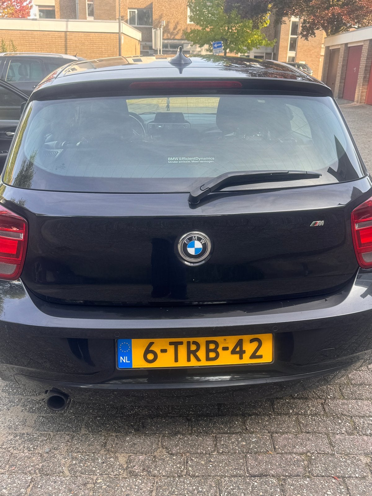 BMW 1-Serie 114I 75KW 5-DR 2014 Zwart, Auto's, Stof, Zwart, 4 cilinders, Zwart