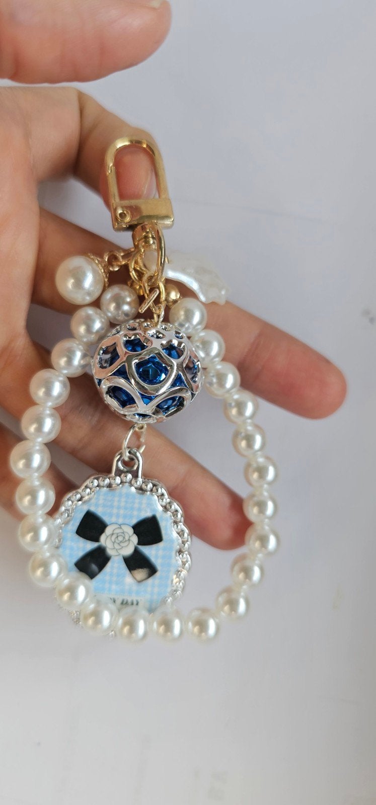 Sleutelhanger met parels en blauwe details, Ophalen of Verzenden, Zo goed als nieuw, Overige typen