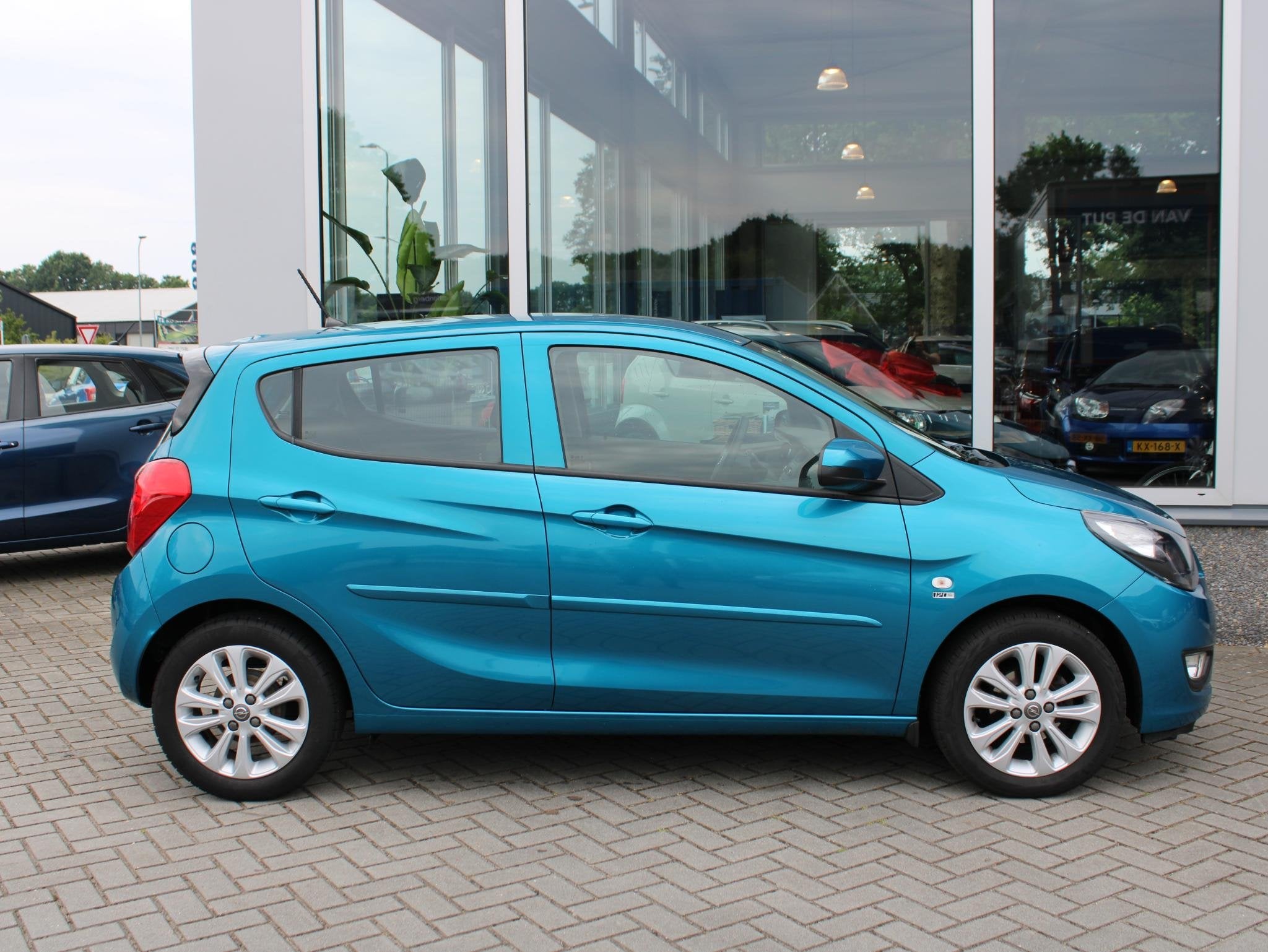 Opel KARL 1.0 ecoFLEX 120 Jaar Edition Airconditioning, Lich, Auto's, Stof, Gebruikt, Blauw, Origineel Nederlands